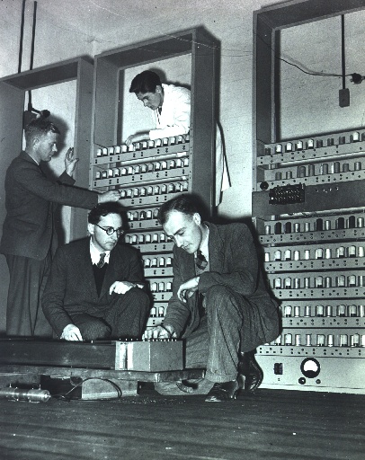 The EDSAC computer at Cambridge: racks of valves and cabling filling a room.